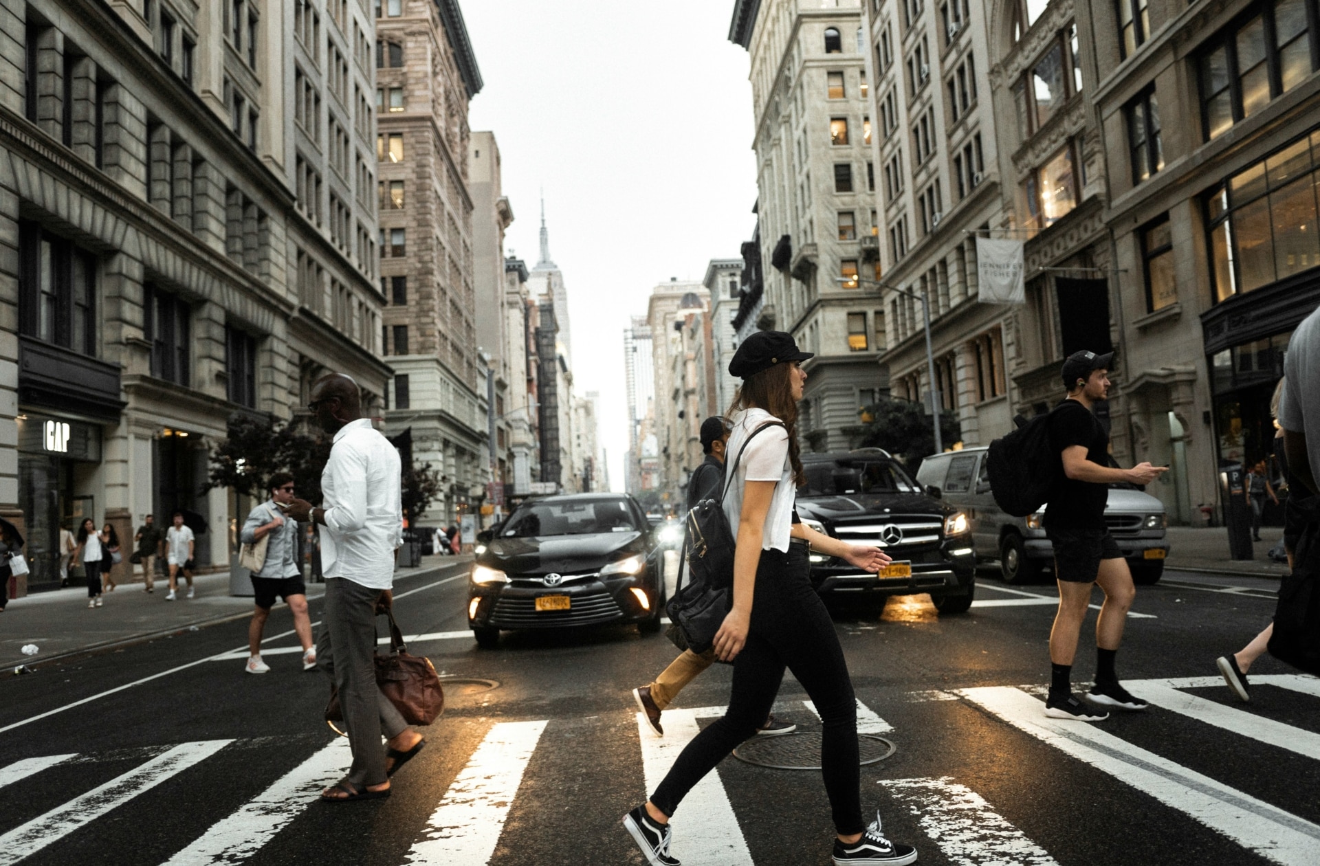 people cross the street in new york city